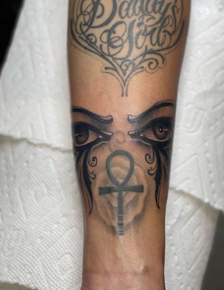 Egyptian Symbol between Eyes of Horus Arm Tattoo