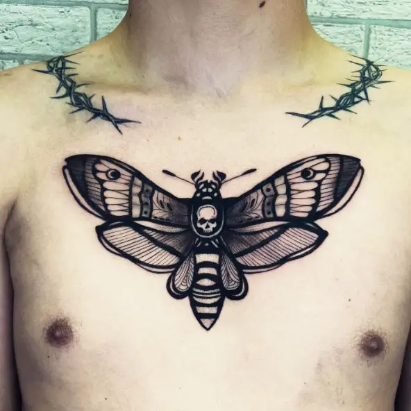 Barb Wired Necklace and Black Skull Moth Chest Tattoo