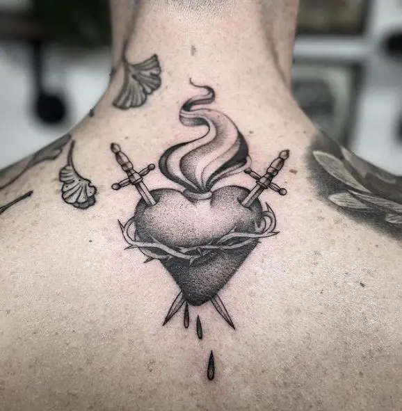 Swords in Bleeding Sacred Heart Back Tattoo