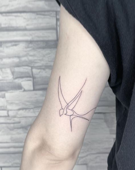 Abstract Lined Swallow Biceps Tattoo