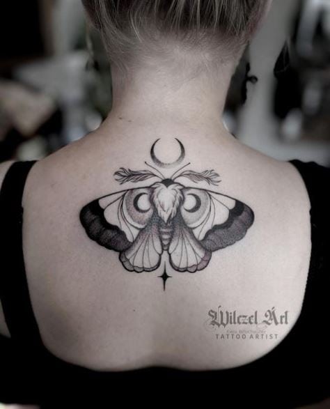 Grey Moth Spine Tattoo