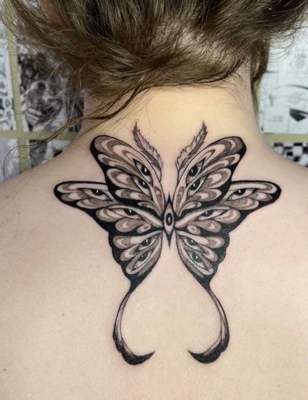 Grey Eyed Moth Back Tattoo