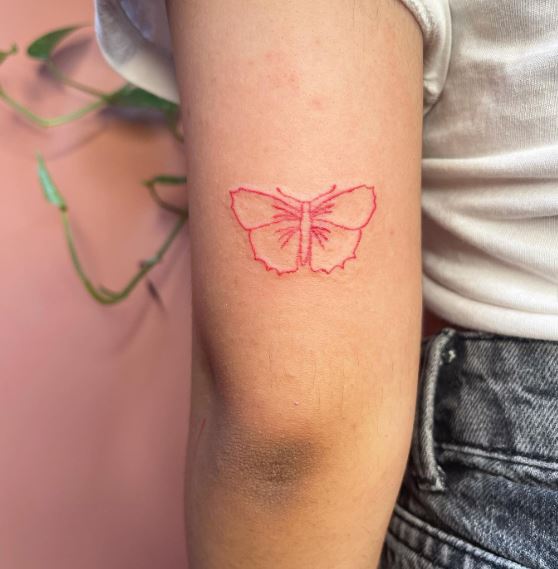 Small Red Butterfly Elbow Tattoo