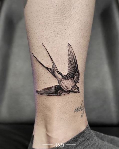 Very Realistic Black Swallow Ankle Tattoo