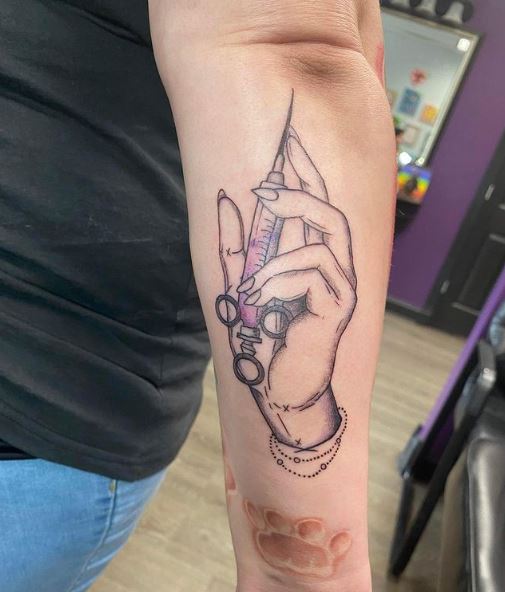 Syringe in Hand Tattoo