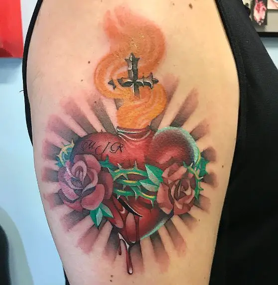 Red Roses on Colorful Bleeding Sacred Heart Arm Tattoo