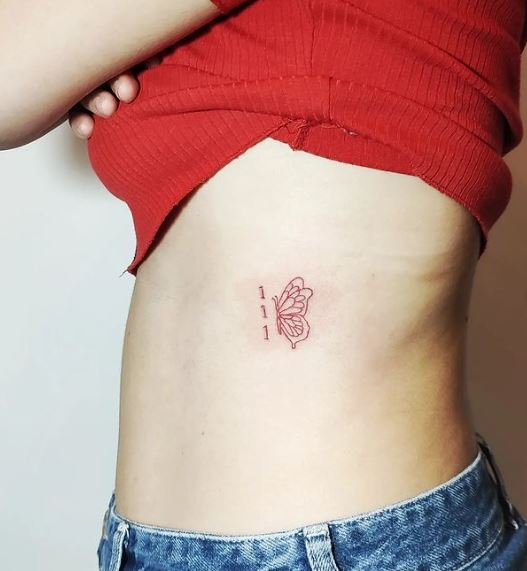 Small Red Butterfly Ribs Tattoo