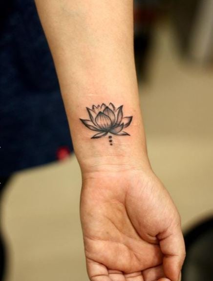 Grey Lotus Flower Wrist Tattoo