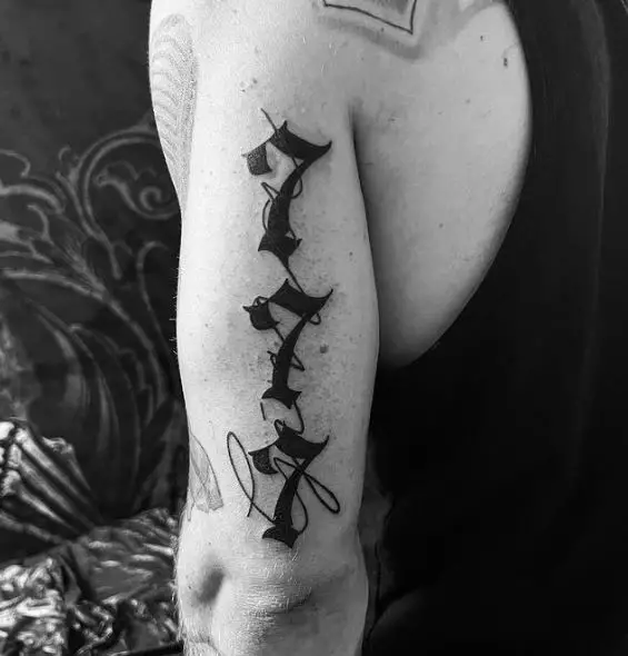 Black Inked 777 Upper Arm Tattoo