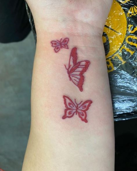 Red Colored Butterflies Wrist Tattoo