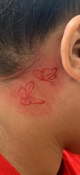 Red Lined Butterflies behind Ear Tattoo