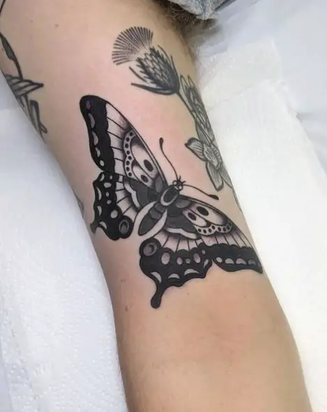 Flowers an Black Butterfly Biceps Tattoo