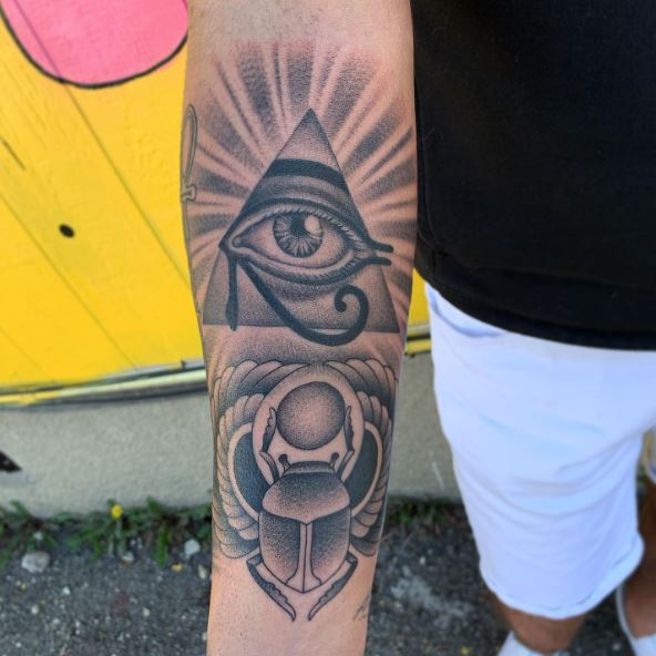 Eye of Horus Inside Pyramid Tattoo