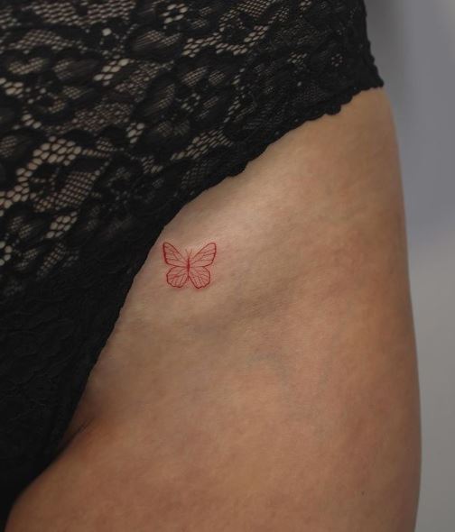 Tiny Red Butterfly Hip Tattoo