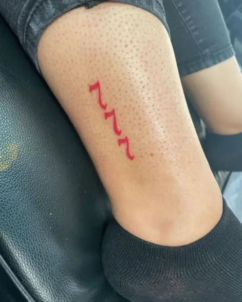 Red Small 777 Calf Muscle Tattoo