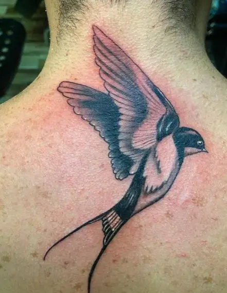 Black and White Flying Realistic Swallow Back Tattoo