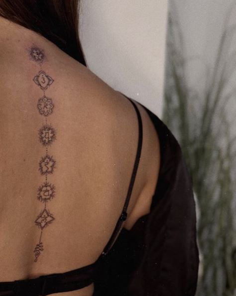 Minimalistic Chakra Symbols Spine Tattoo