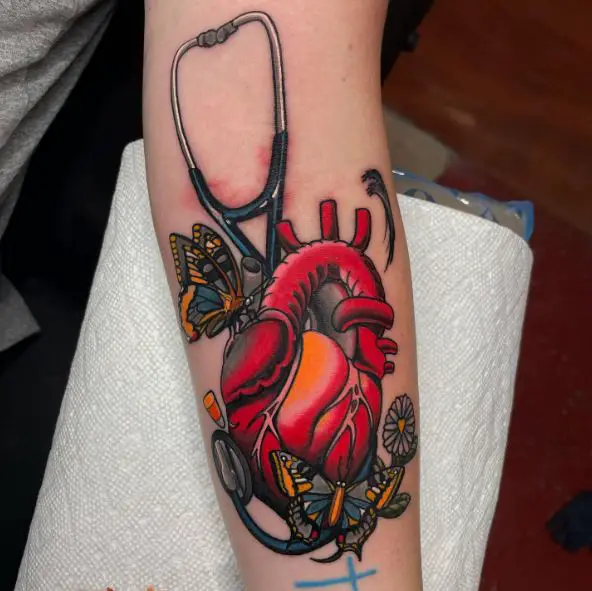 Human Heart with a Stethoscope and Butterflies Tattoo