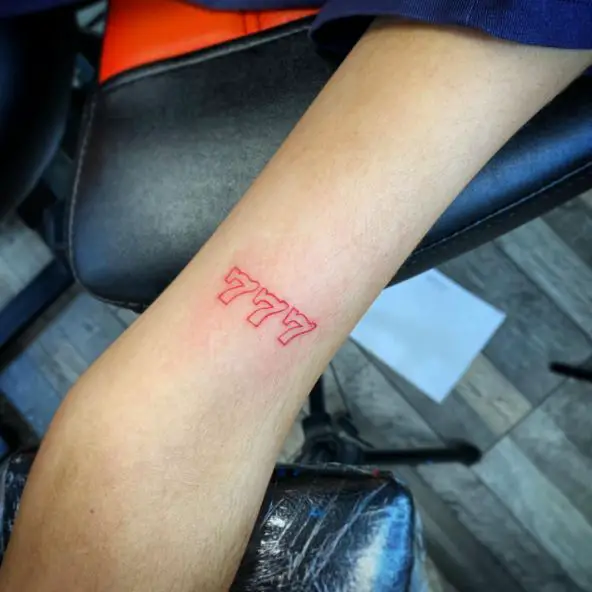 Red Lined 777 Biceps Tattoo