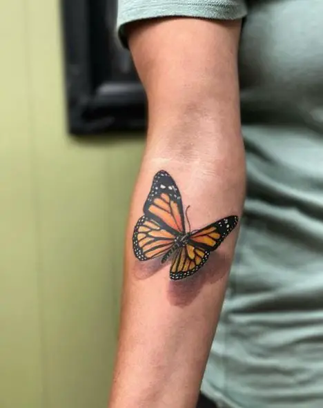 Realistic Monarch Butterfly Forearm Tattoo