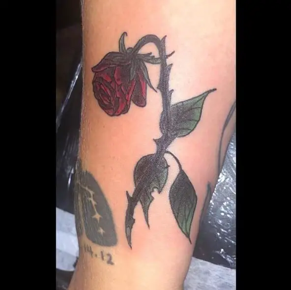 Dying Red Rose with Green Leaves Tattoo