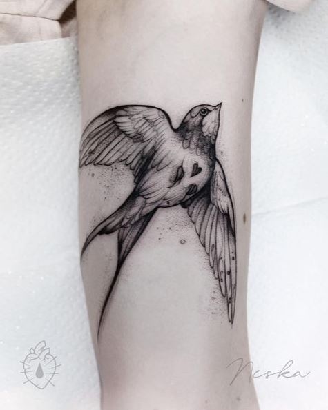 Flying Swallow with Realistic Feathers Tattoo