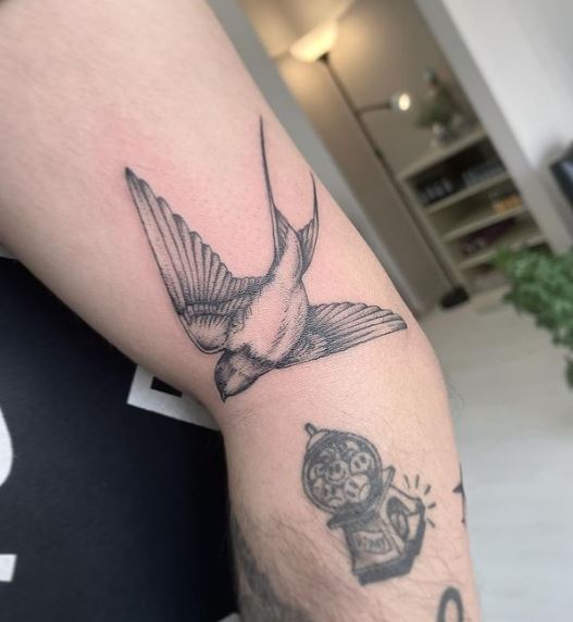 Grey Dot-work Swallow Elbow Tattoo