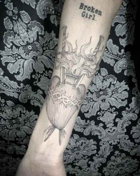 Grey Stabbed Sacred Heart Forearm Tattoo