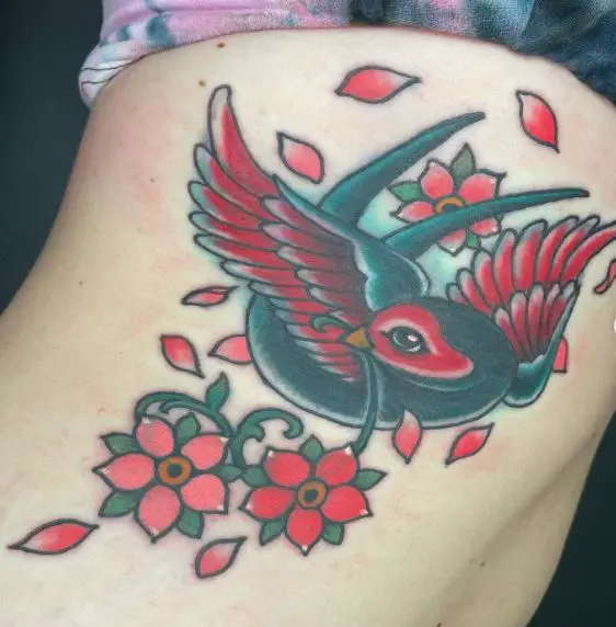Red Flowers and Black Sparrow Ribs Tattoo
