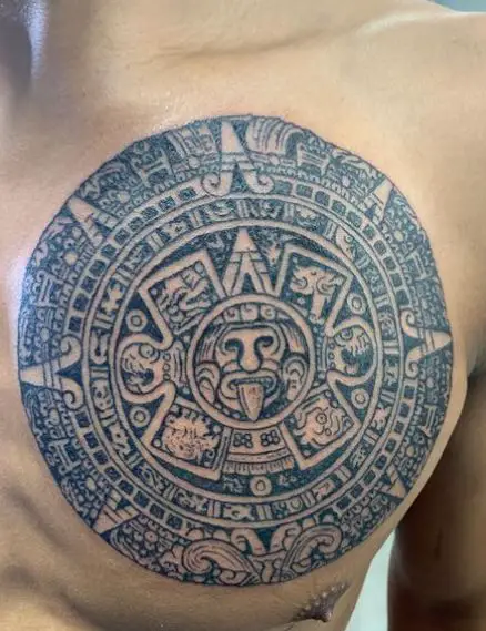 Big Grey Mayan Calendar Chest Tattoo