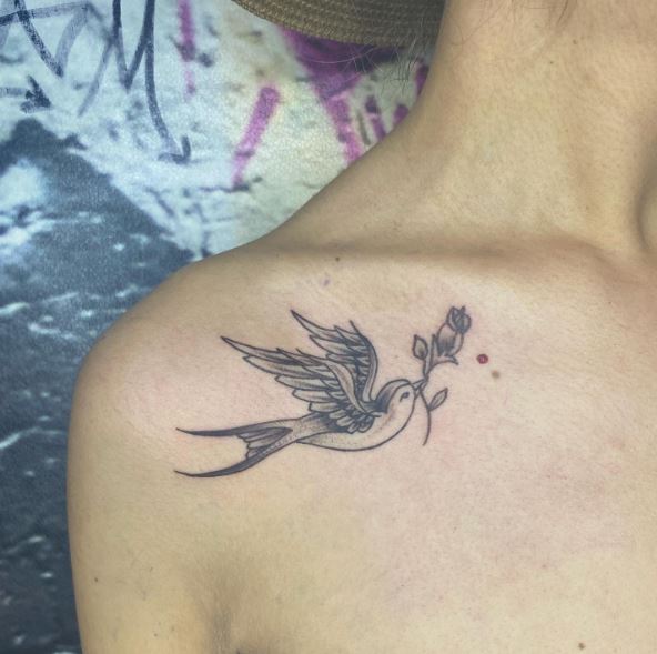 Grey Flying Swallow with Flower in Beak Shoulder Tattoo