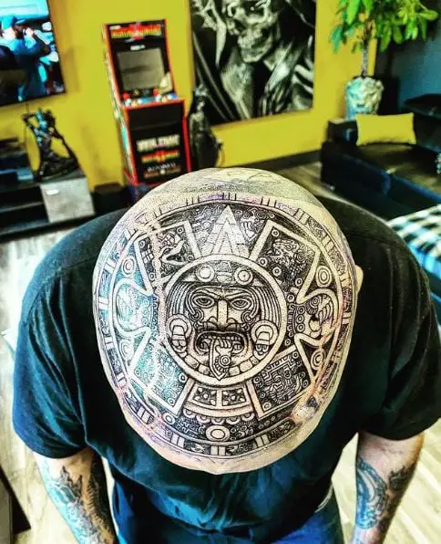 Black and Grey Mayan Calendar Head Tattoo
