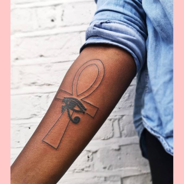 Linework Ankh and Eye of Horus Arm Tattoo