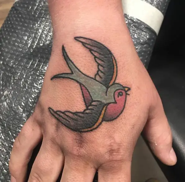 Flying Sparrow Hand Tattoo