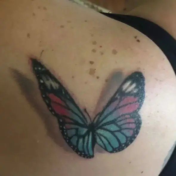Realistic Butterfly Hip Tattoo