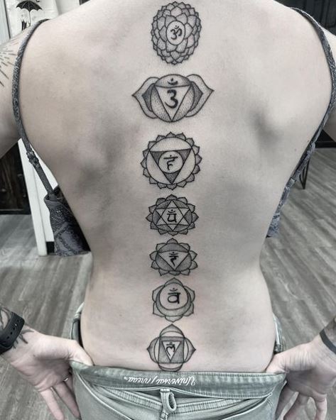 Grey Shaded Chakra Symbols Spine Tattoo