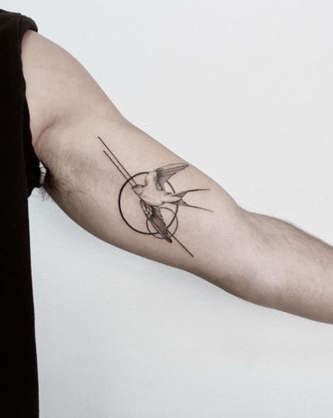 Black and Grey Flying Swallow Biceps Tattoo