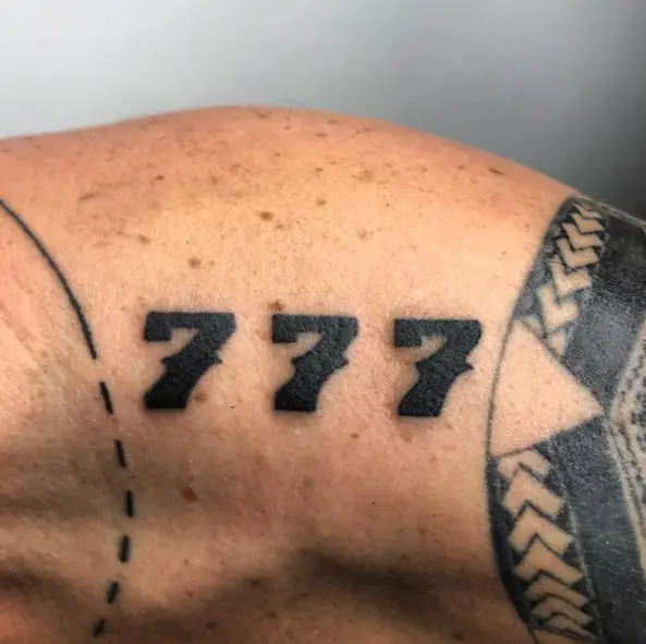 Black 777 Shoulder Tattoo