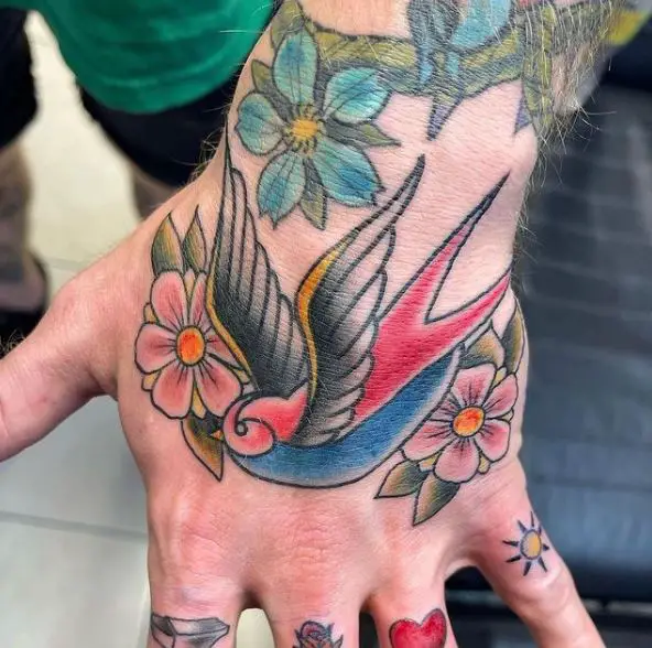 Flowers and Sparrow Hand Tattoo