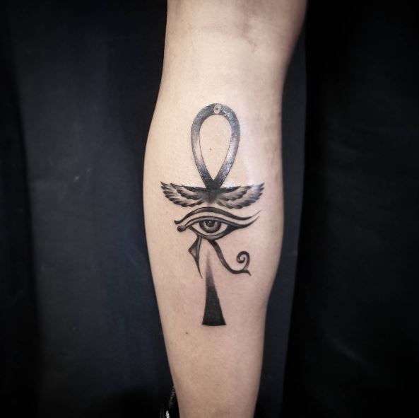 Black Ankh with Wings and Eye of Horus Tattoo