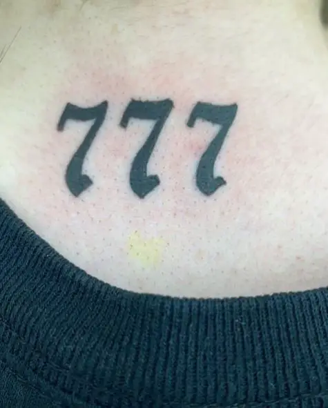 Grey 777 Back Tattoo