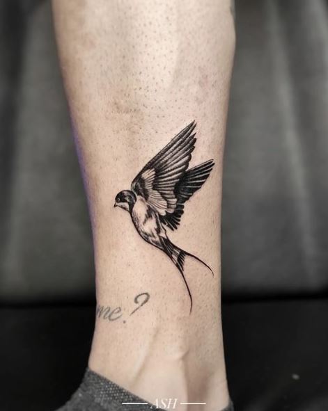 Black Flying Swallow with Wings Up Ankle Tattoo