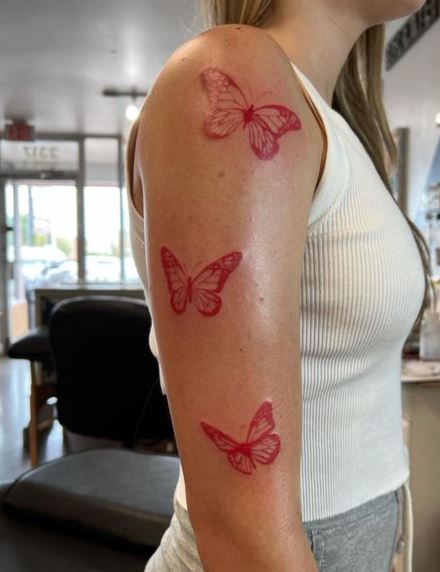 Red Monarch Butterflies Arm Tattoo