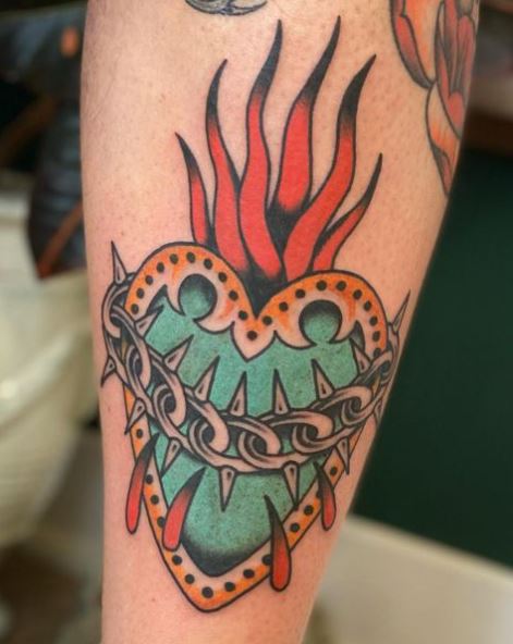 Burning Colorful Sacred Heart Tattoo