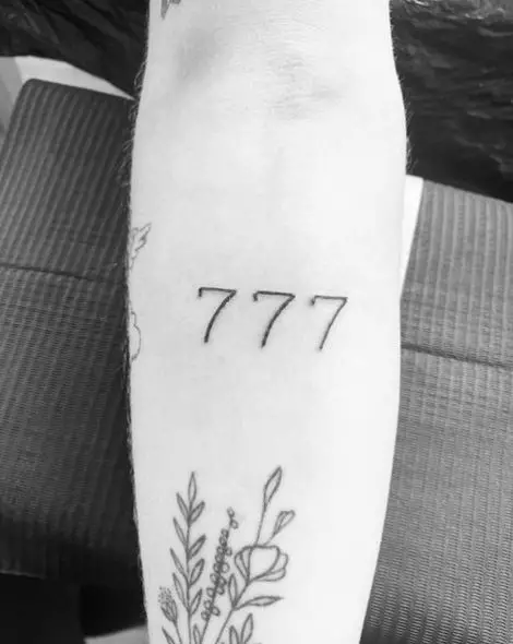 Thin Lines 777 Forearm Tattoo