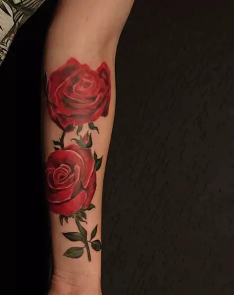 Big Red Roses Forearm Tattoo