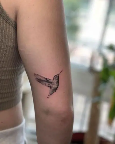 Small Black Hummingbird Tattoo on Elbow