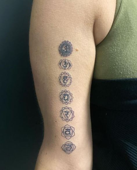 Minimalistic Chakra Symbols Biceps Tattoo