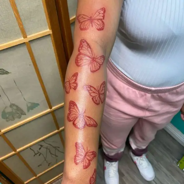 Red Butterflies Arm Tattoo
