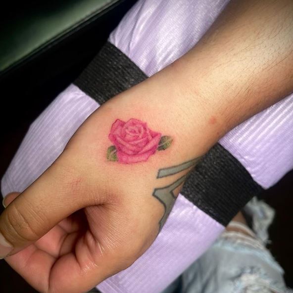 Tiny Little Pink Rose Hand Tattoo
